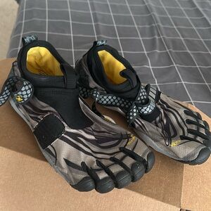 Vibram shoes. Bought them for my husband but only used once.